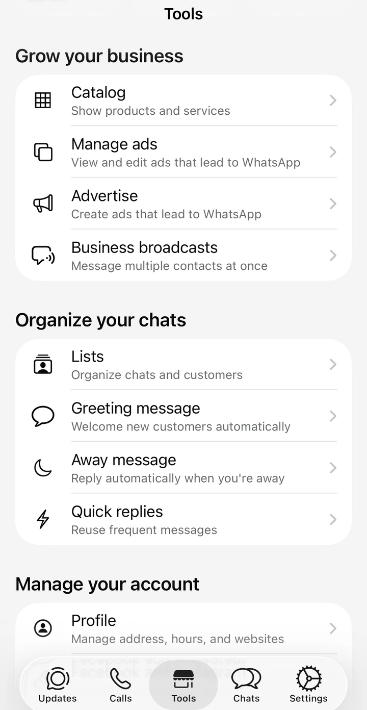 The Tools tab in the WhatsApp Business app, showing Catalog, Manage ads, Advertise and Business broadcasts under 'Grow your business', and Lists, Greeting message, Away message and Quick replies under 'Organize your chats'